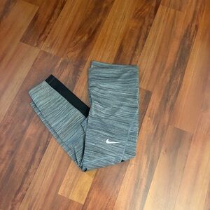 Nike Women’s ' Heather Gray Athletic Leggings- Black mesh feature on lower legs